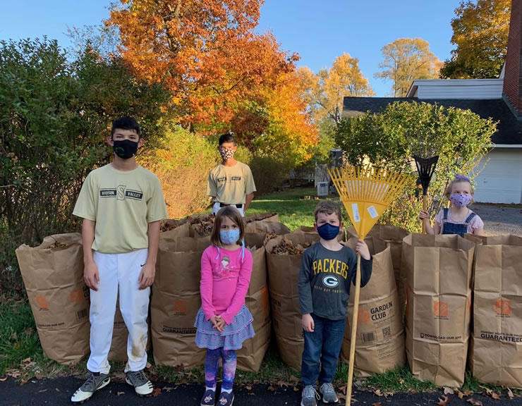 Helping Neighbors by Raking Leaves